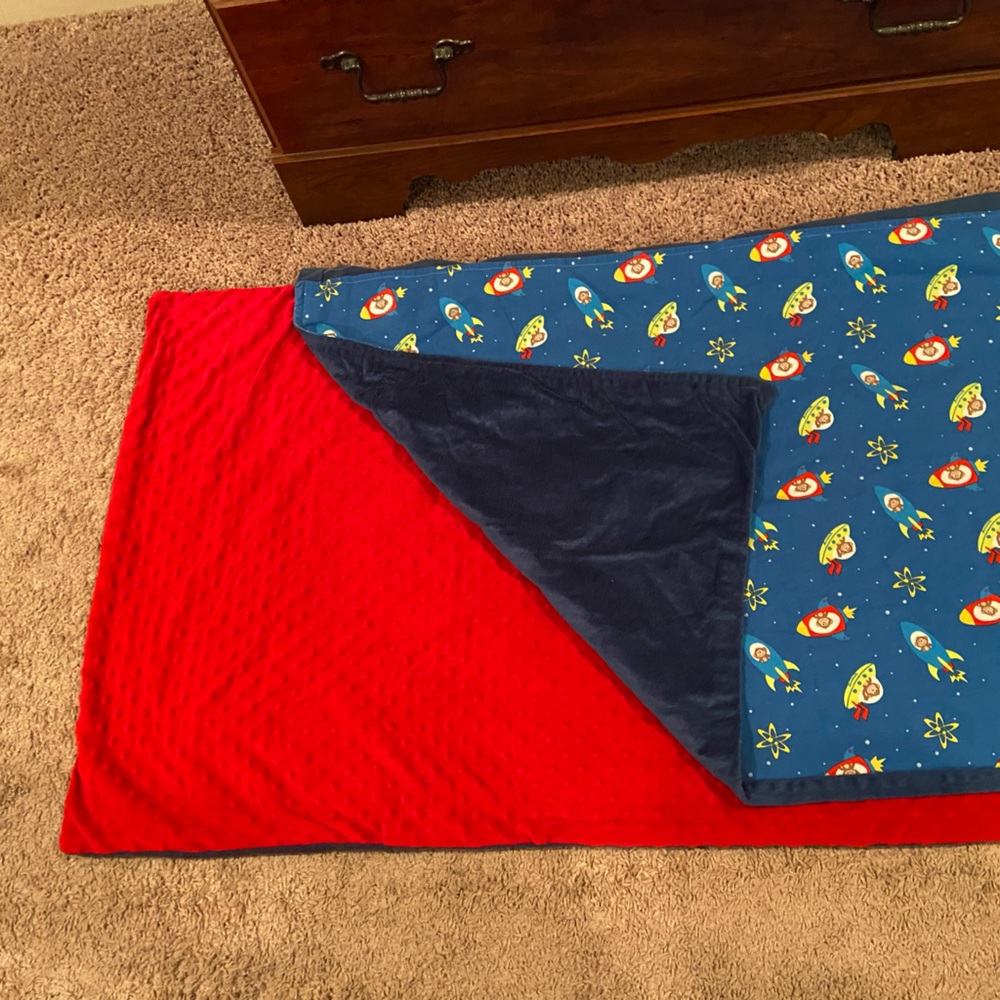 Nap mat cover. Red/blue with monkey pattern. 26”x51”.